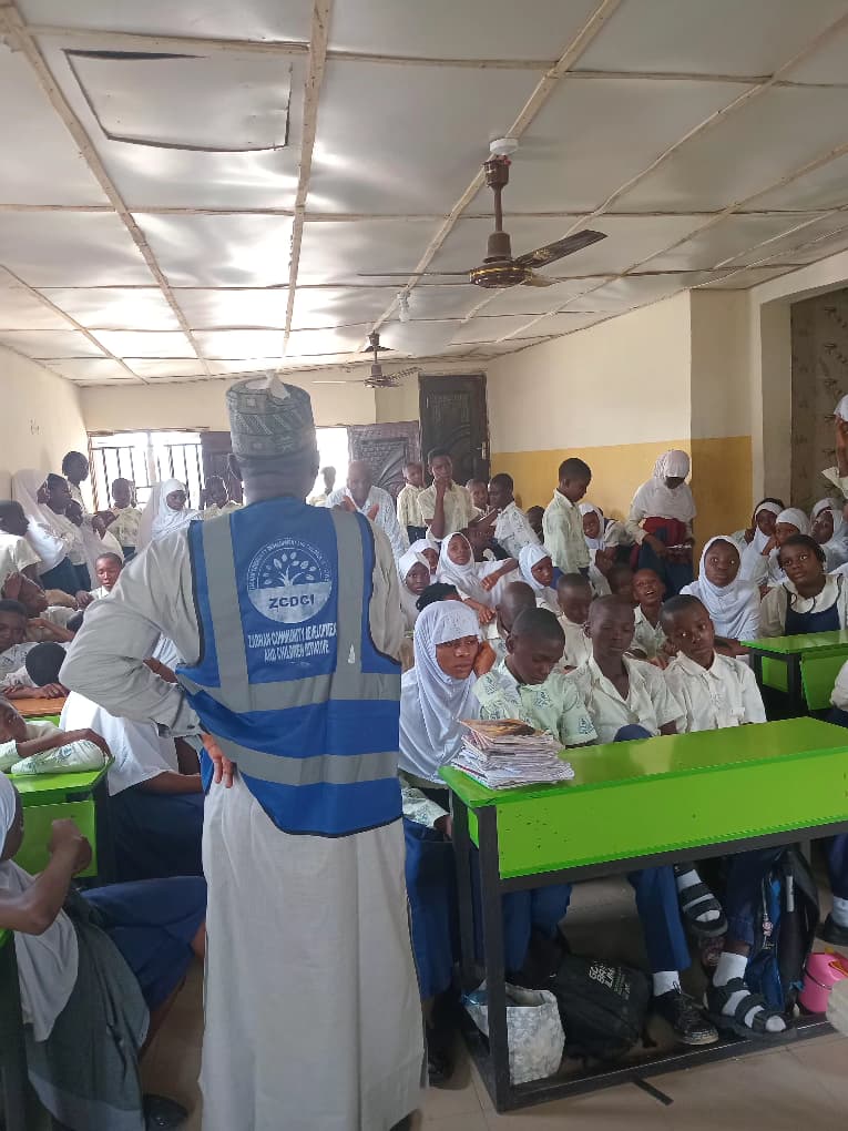 ZCDCI educator addressing school children
